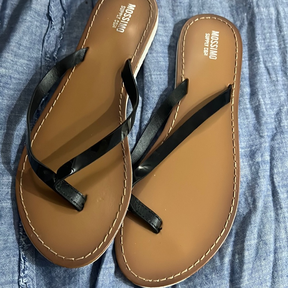 Womens black thongs . worn a couple of times. very cute .